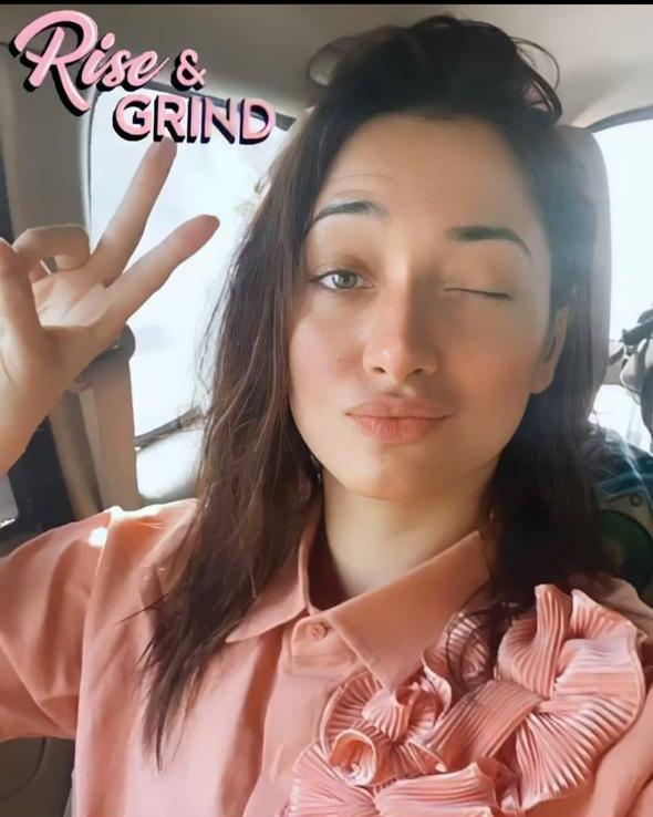 TAMANNA BHATIA IN ORANGE FLOWER SHIRT