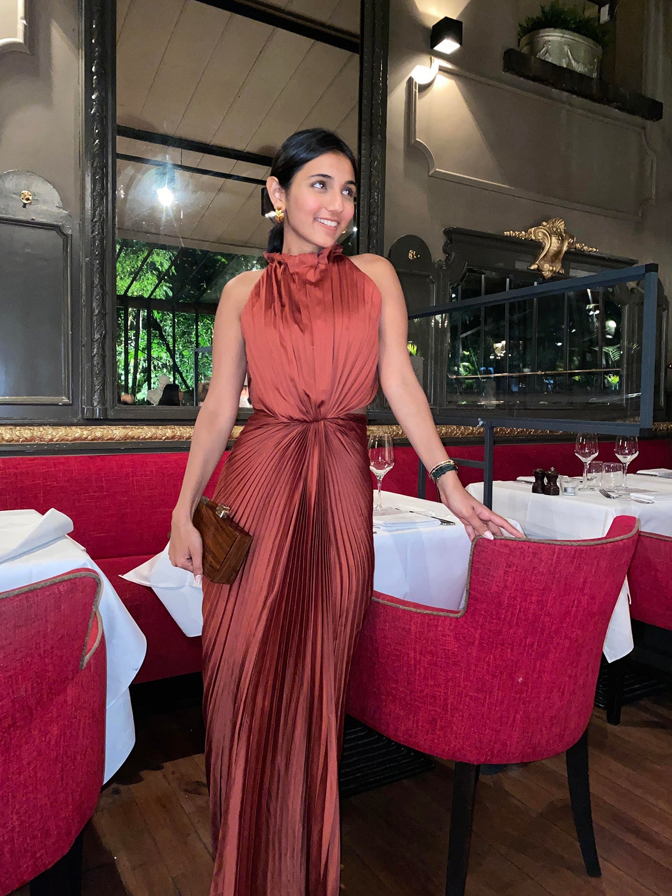 ORANGE PLEATED HALTER GOWN