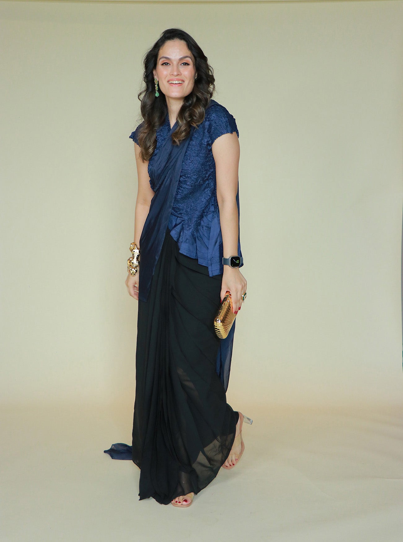 BLUE CRINKLED TOP PAIRED WITH BLACK AND BLUE SAREE
