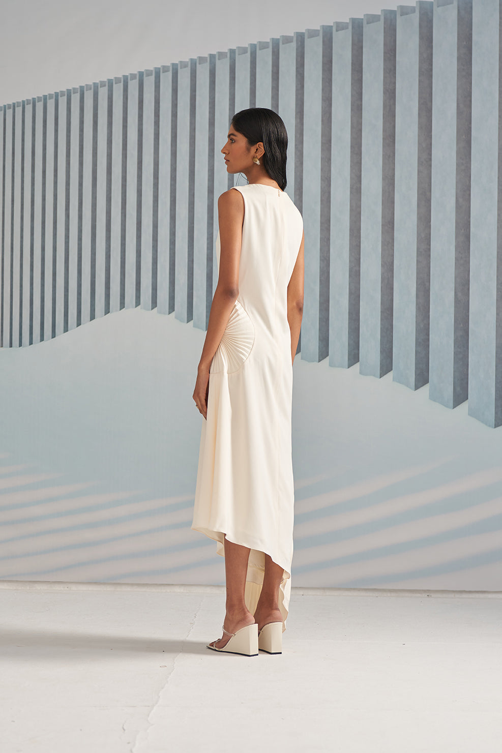 WHITE CIRCULAR DETAIL PLEATS GOWN