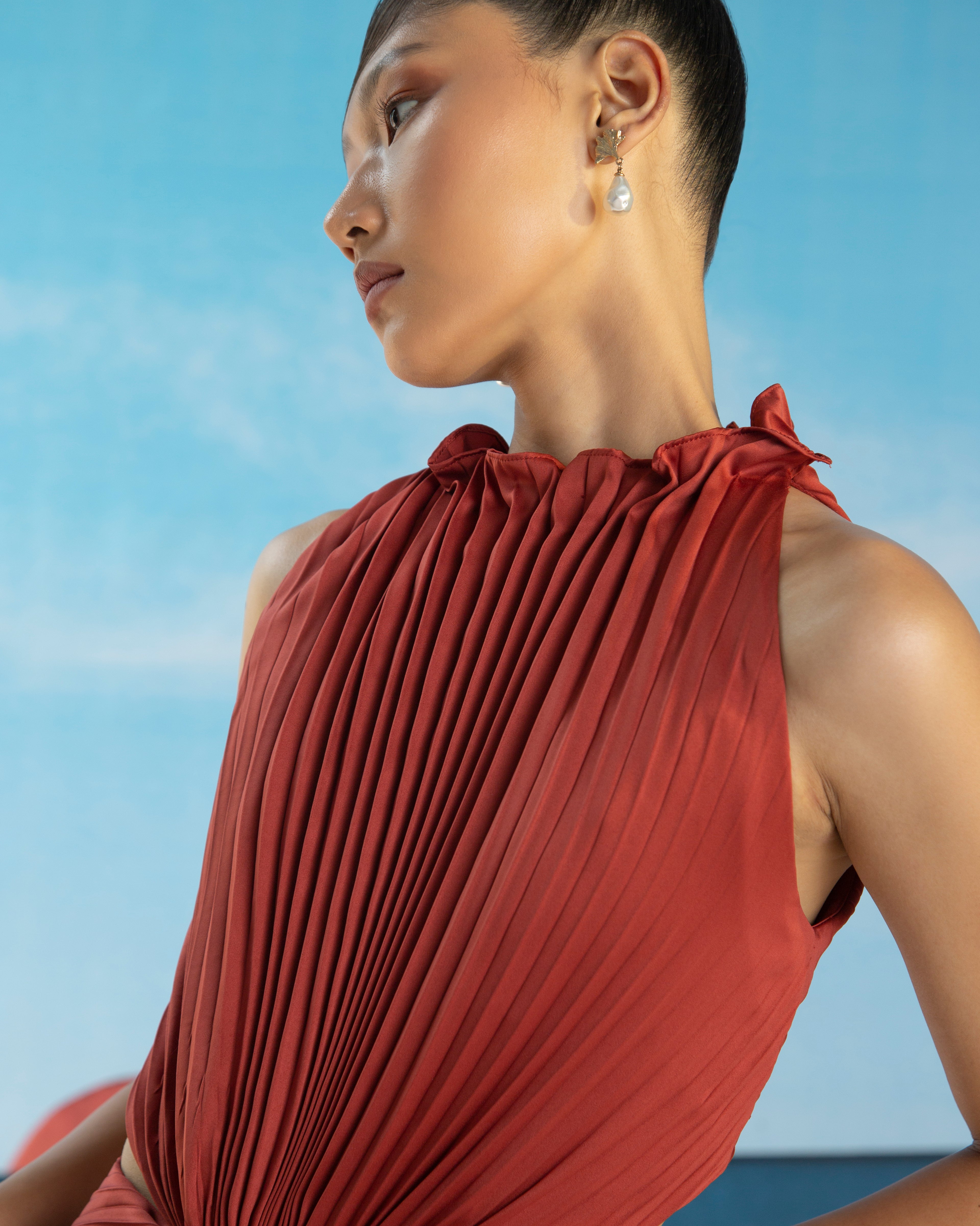 ORANGE PLEATED HALTER GOWN