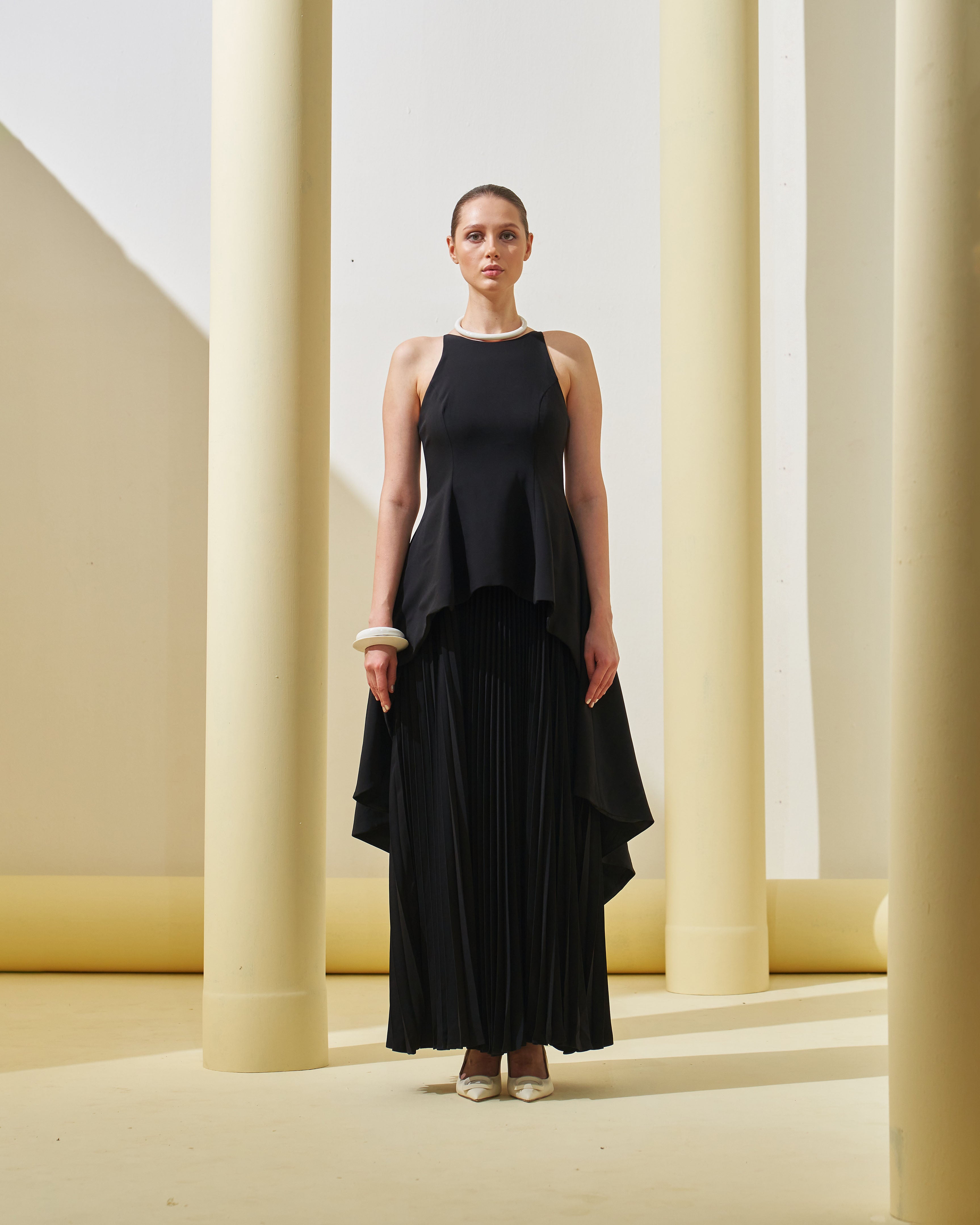 BLACK PEPLUM PLEATED GOWN