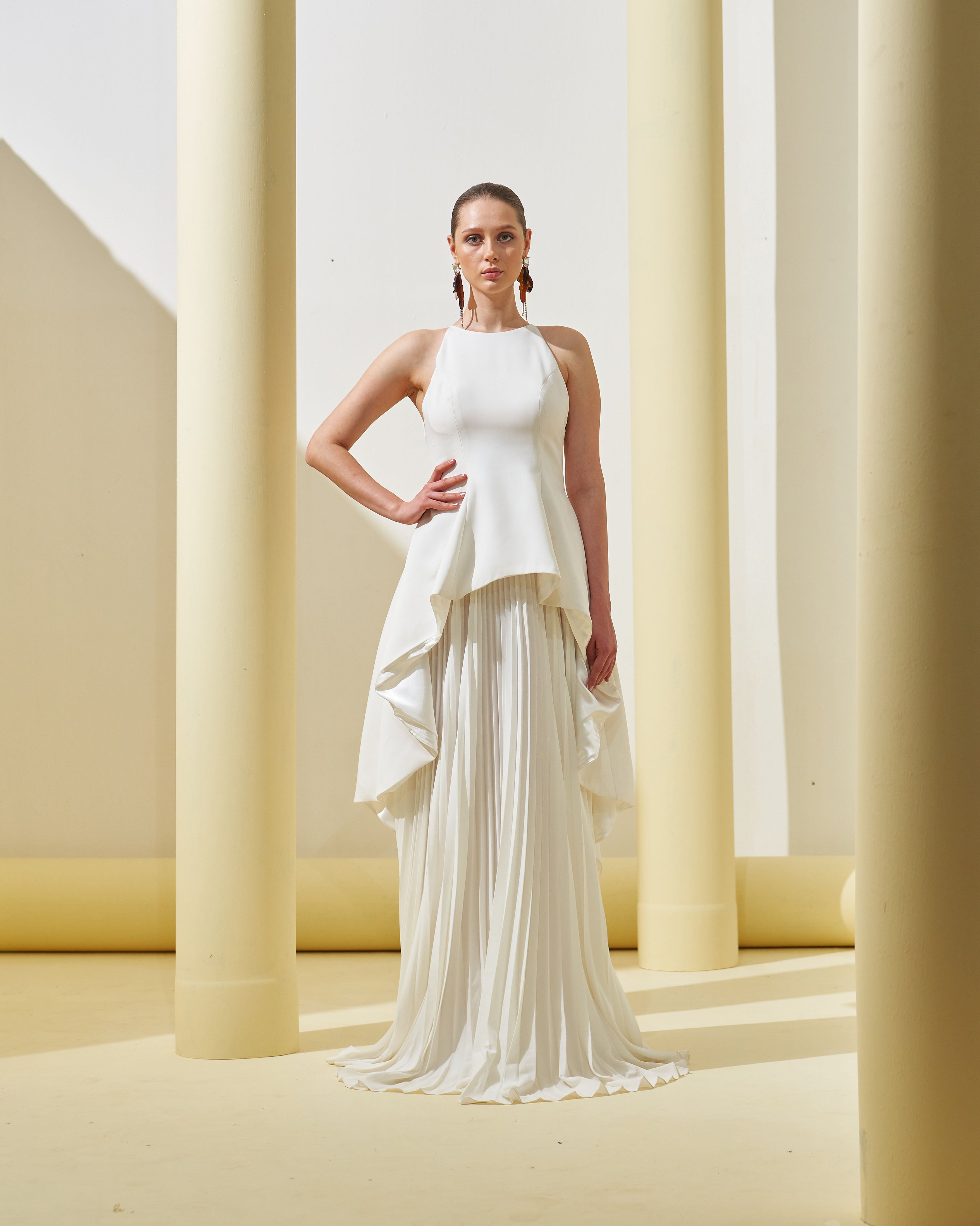 WHITE PEPLUM PLEATED GOWN