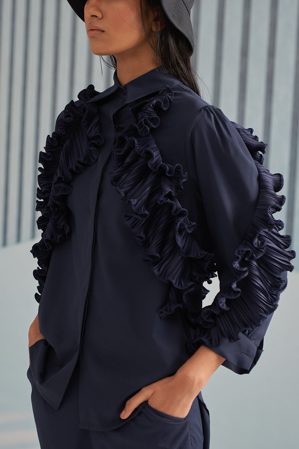 BLUE SHIRT WITH RUFFLE DETAILS