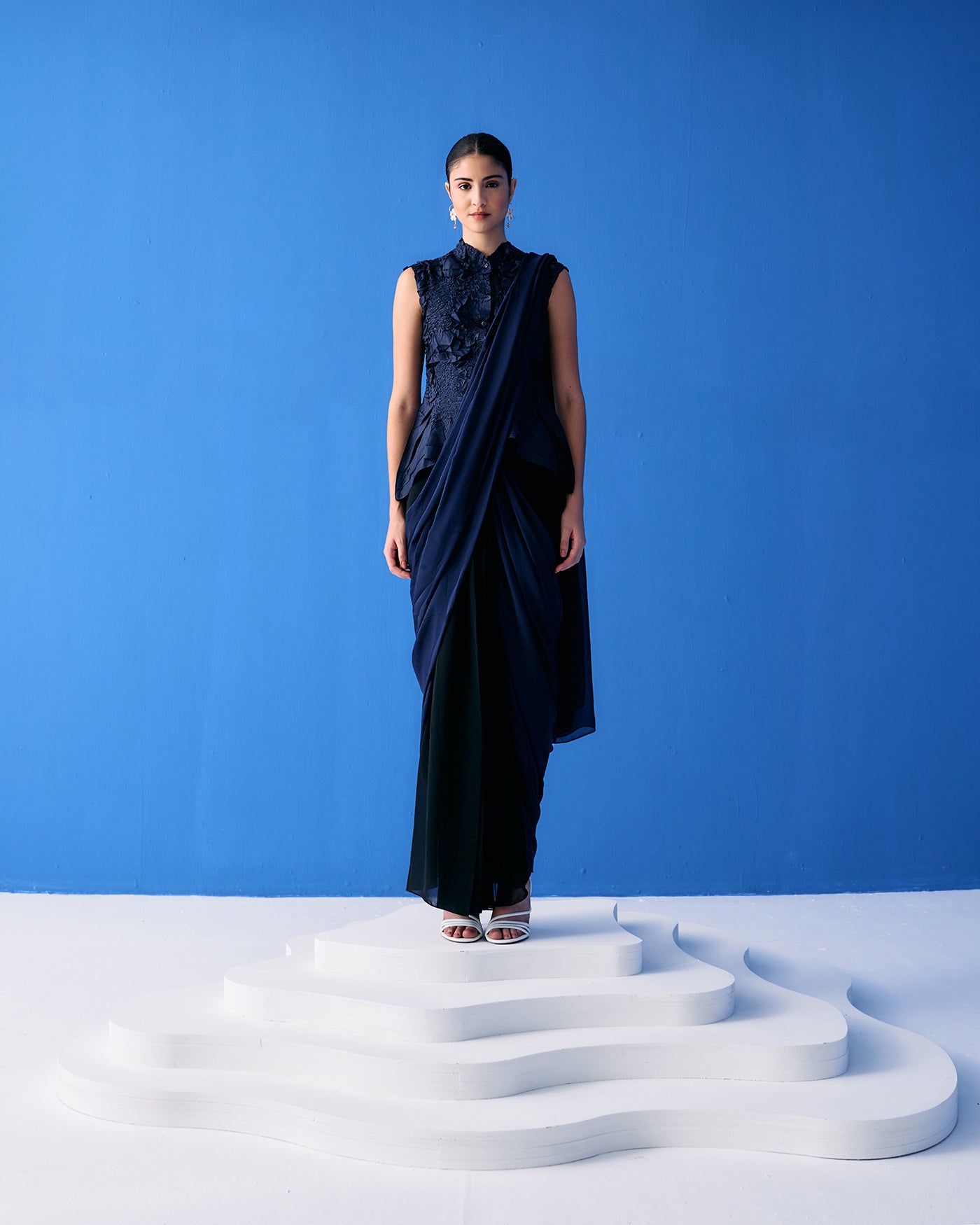 BLUE CRINKLED TOP PAIRED WITH BLACK AND BLUE SAREE