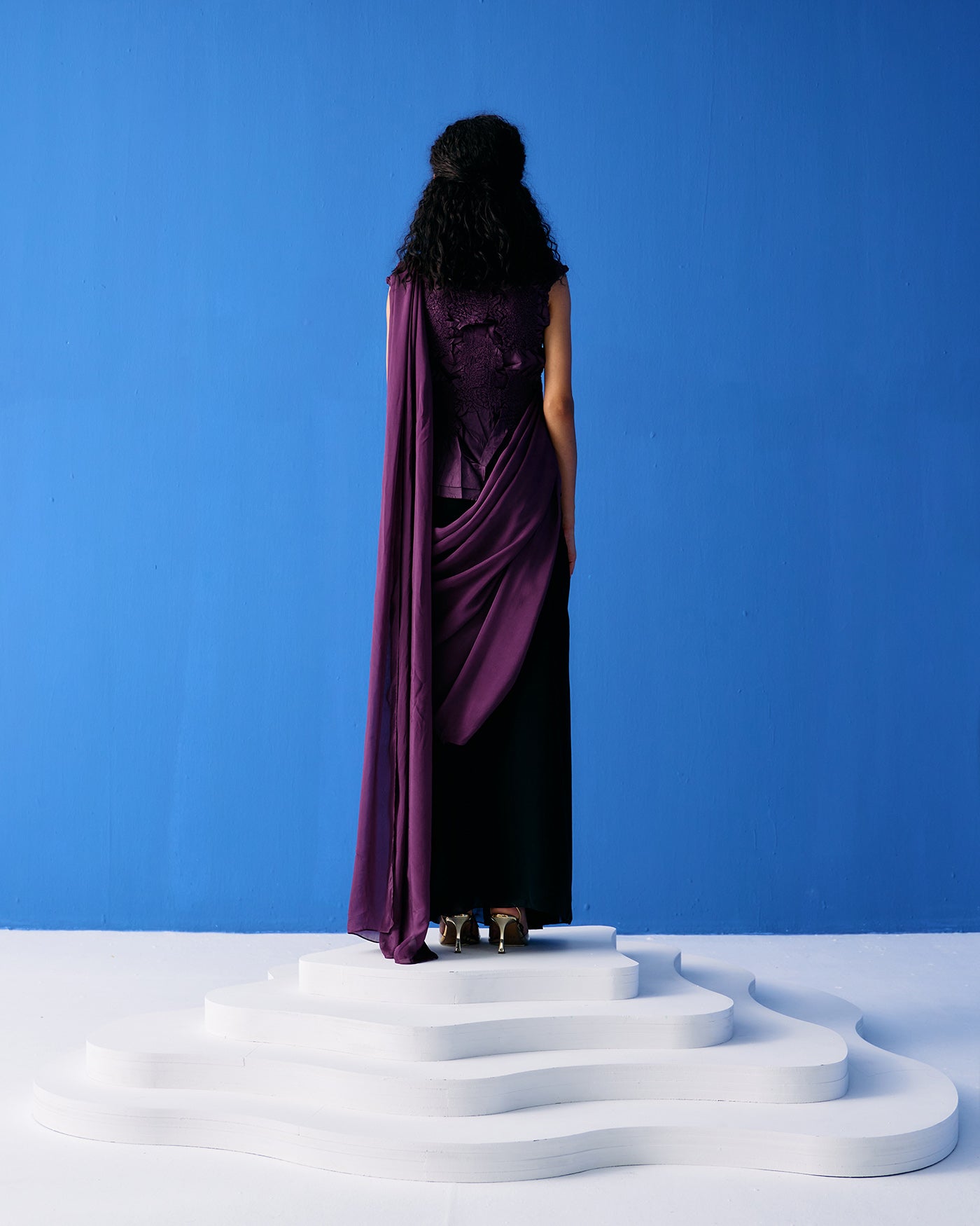 PURPLE CRINKLED TOP PAIRED WITH BLACK AND PURPLE SAREE