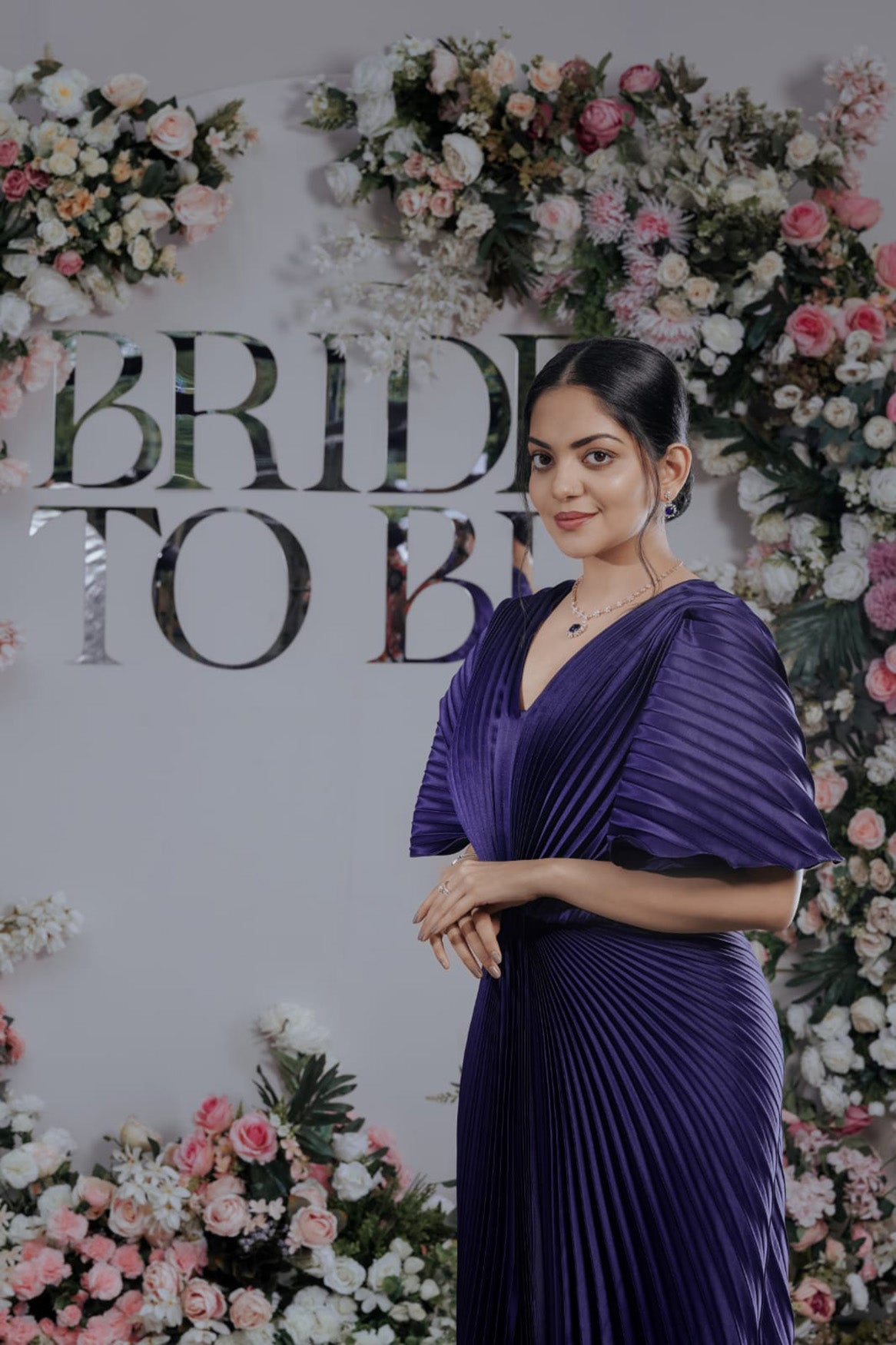 BLUE PLEATED WINGED GOWN