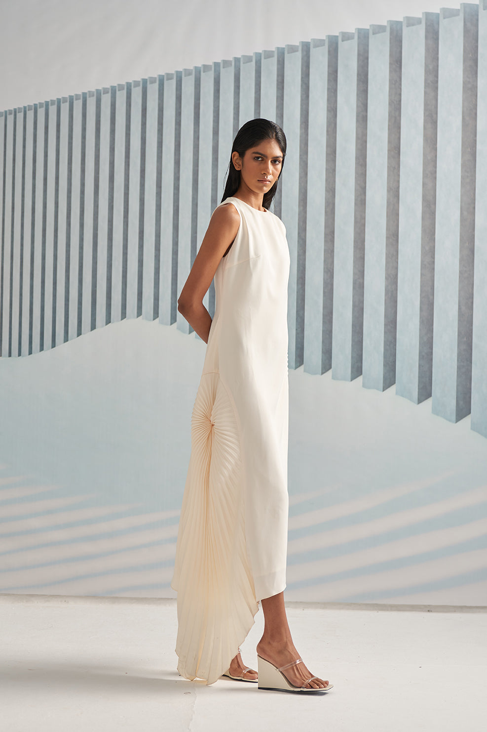 WHITE CIRCULAR DETAIL PLEATS GOWN