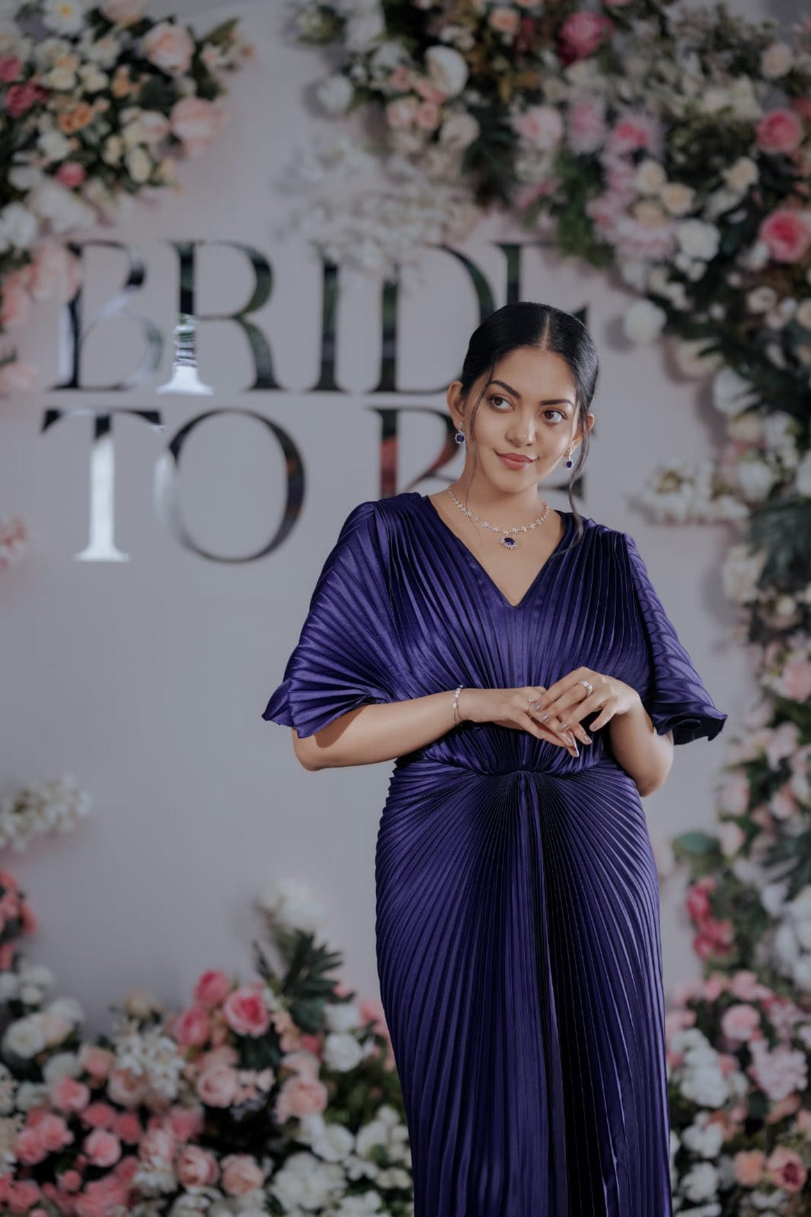 BLUE PLEATED WINGED GOWN