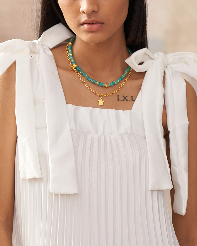 WHITE PLEATS SLIP DRESS