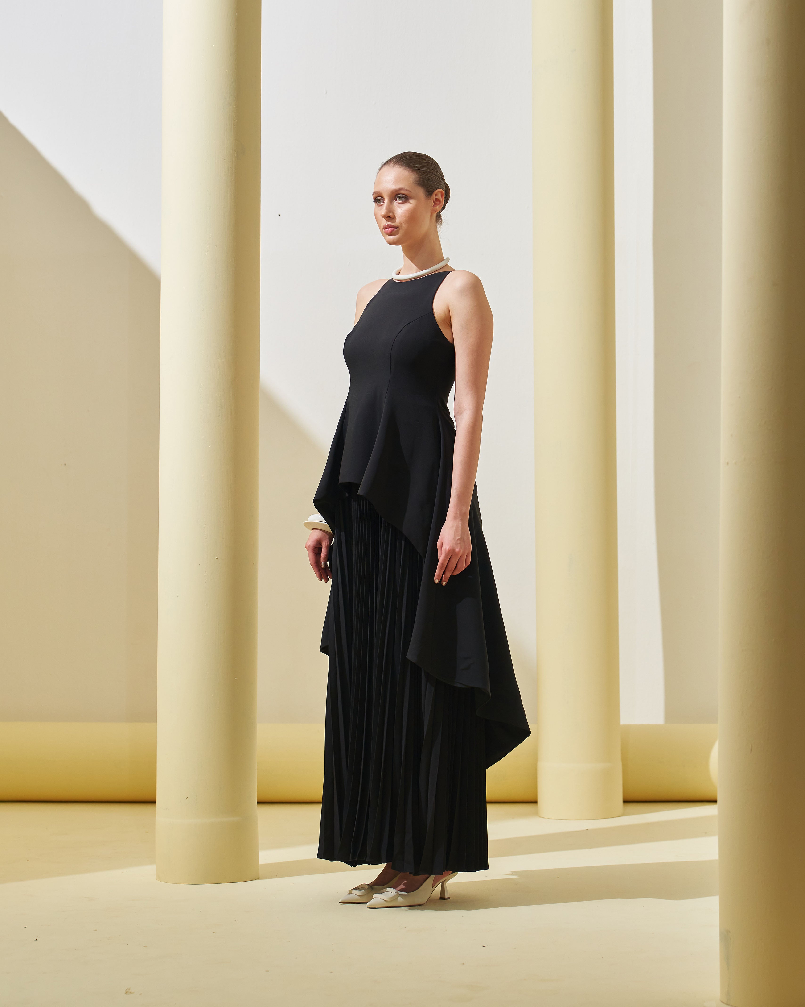 BLACK PEPLUM PLEATED GOWN
