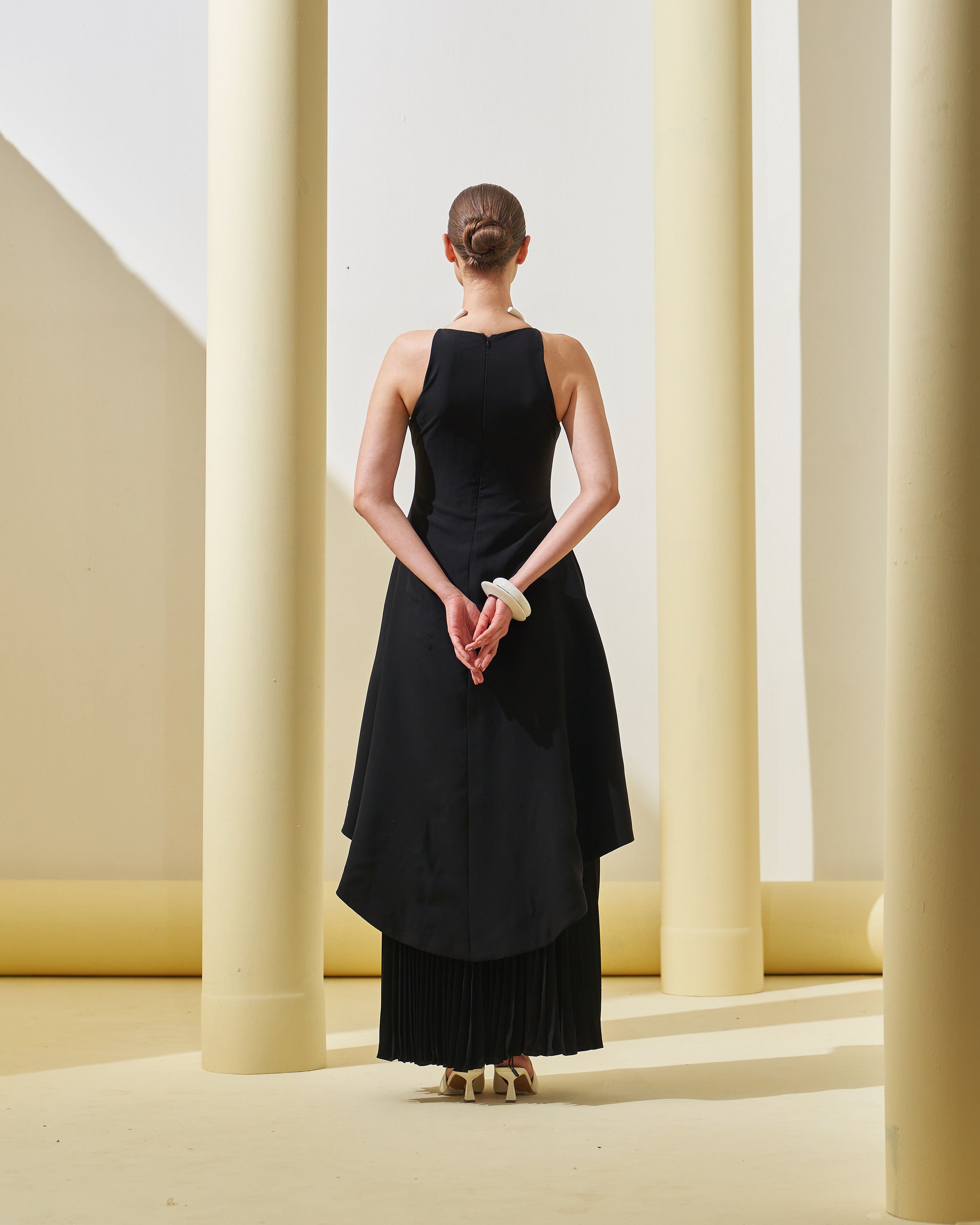 BLACK PEPLUM PLEATED GOWN