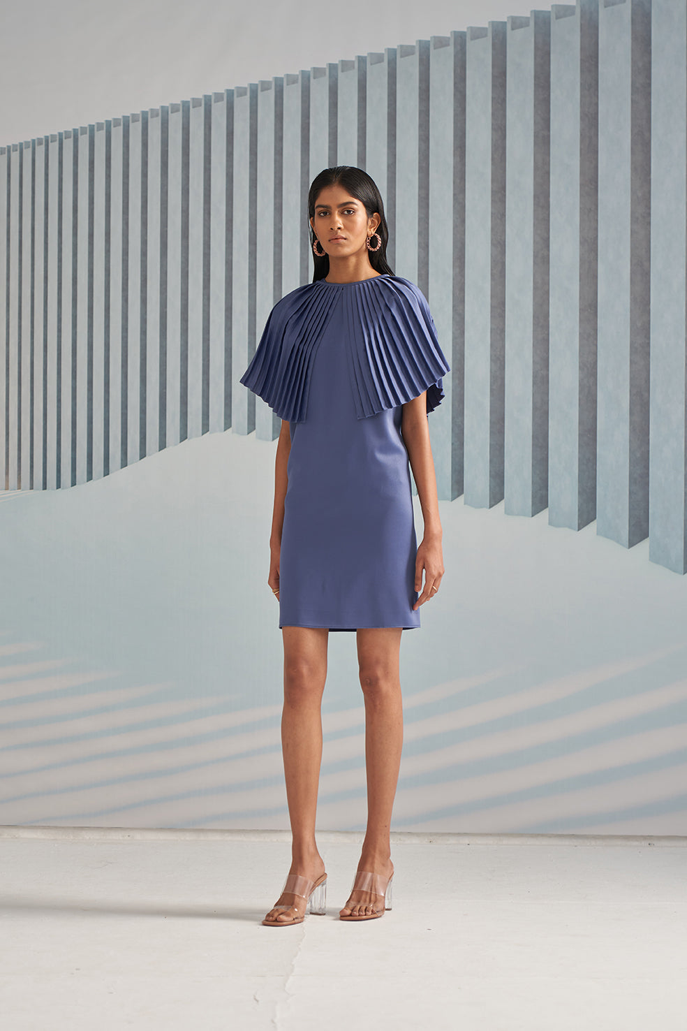 BLUE DRESS WITH PLEATED CAPE