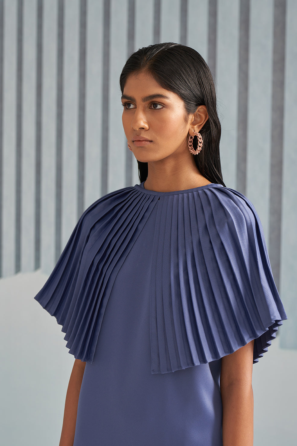 BLUE DRESS WITH PLEATED CAPE