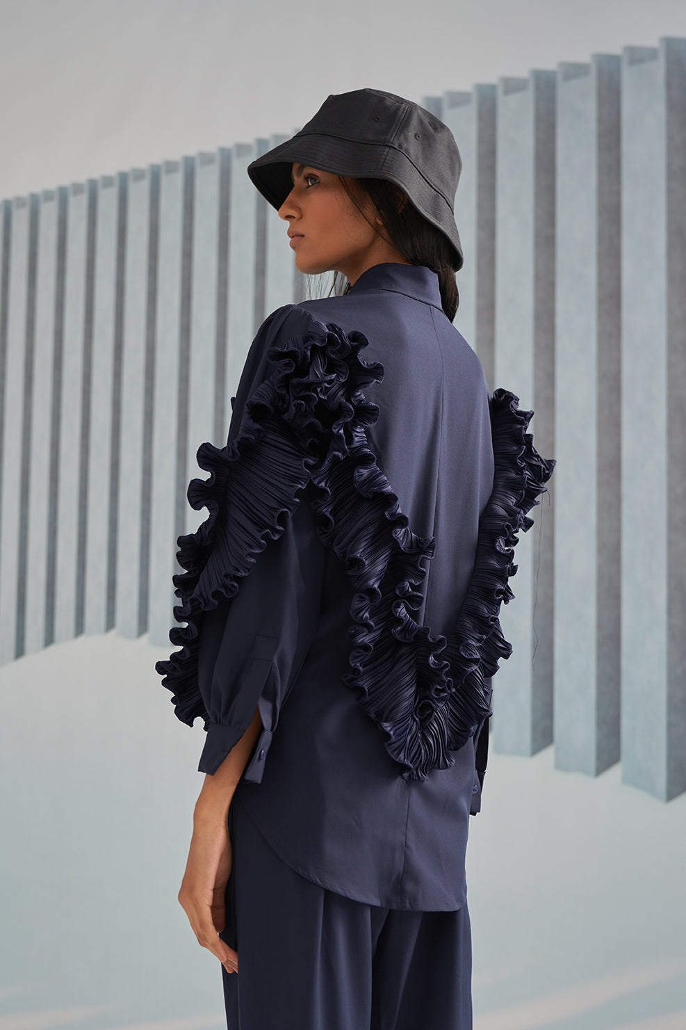 BLUE SHIRT WITH RUFFLE DETAILS