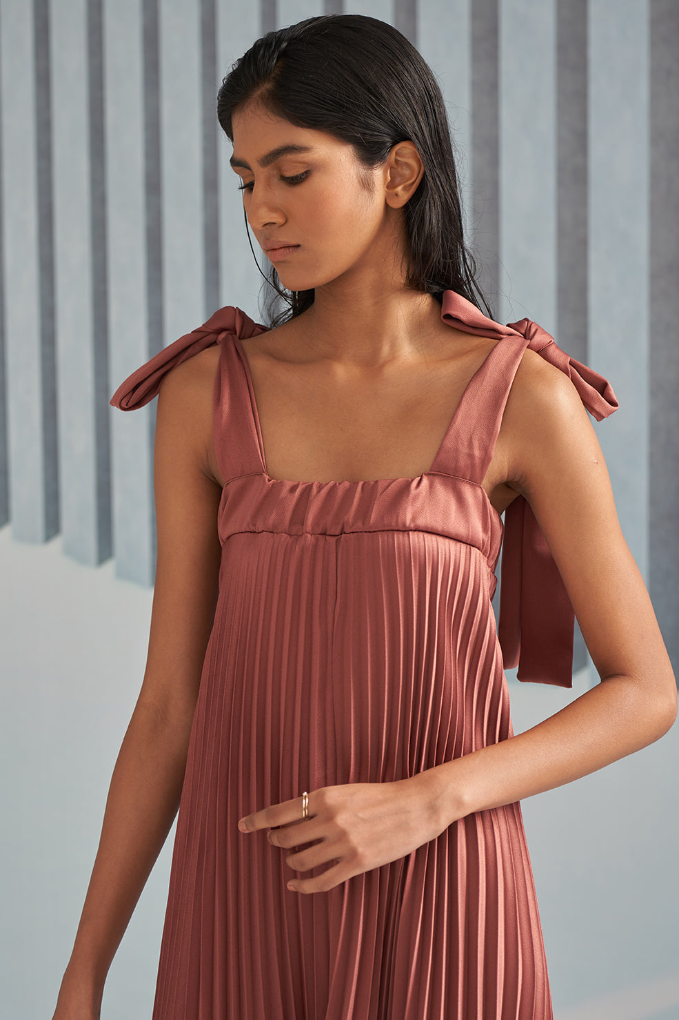 RUST PLEATS SLIP DRESS